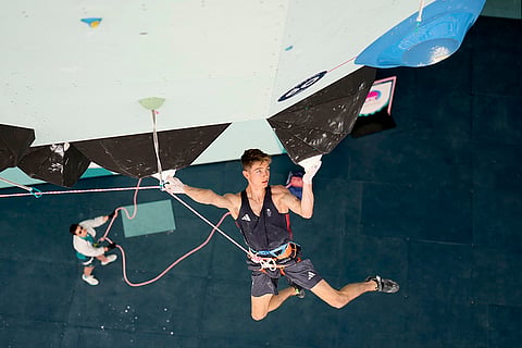 Toby Roberts of Great Britain competes in sport climbing competition